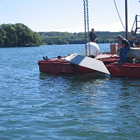 HMS 8000 is lowered into the waters of Smith Cove, near Castine, Maine.